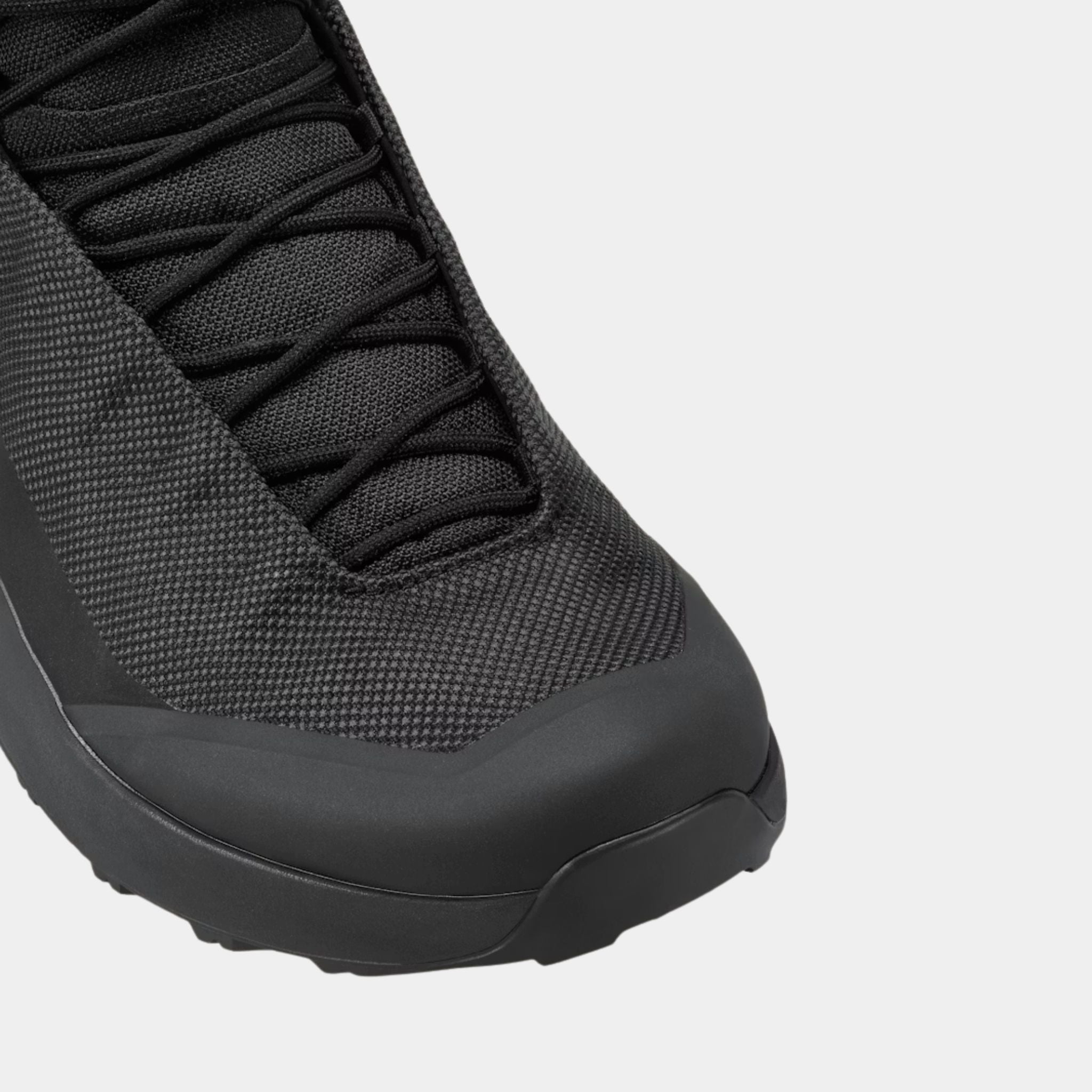 Closeup view of the toe box on the Arc’teryx Kopec Mid GTX Boot in black