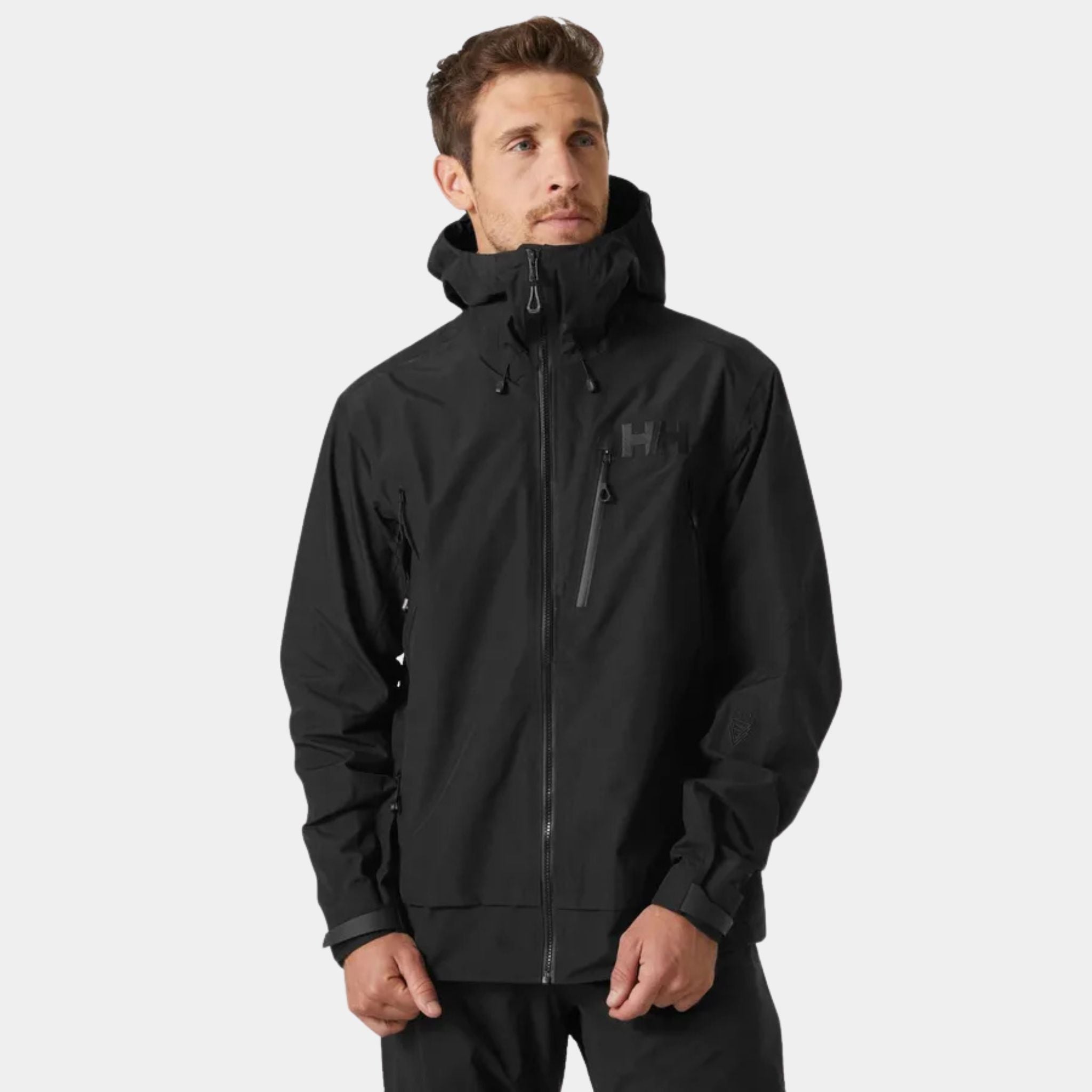 Male Model wearing the Helly Hansen Odin 9 Worlds 3.0 Hard Shell Jacket in Black Front View