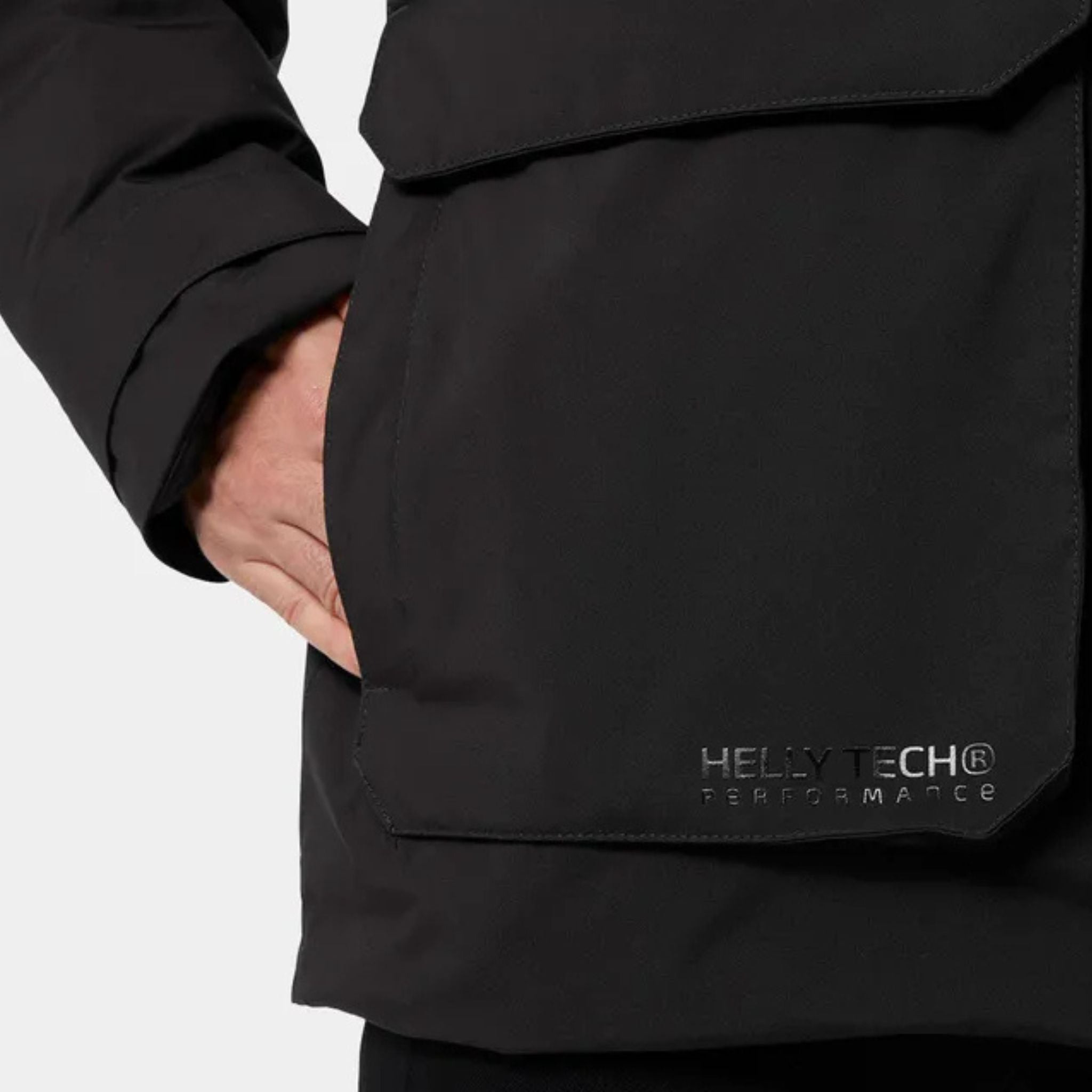 Close up of the pockets on a Black Helly Hansen Reine Parka
