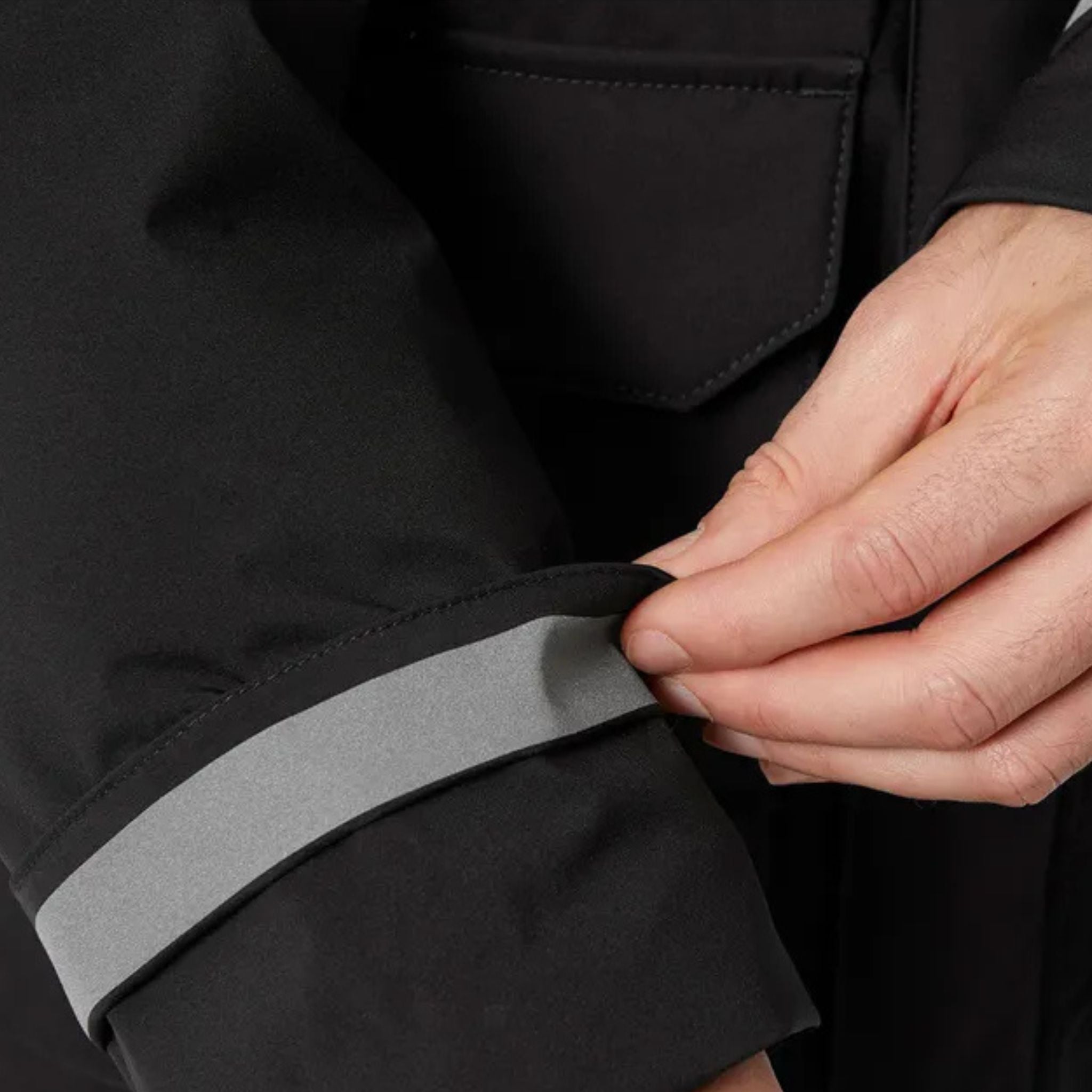 Close Up of the Reflective Tape on the inside of the sleeves of a Black Helly Hansen Reine Parka
