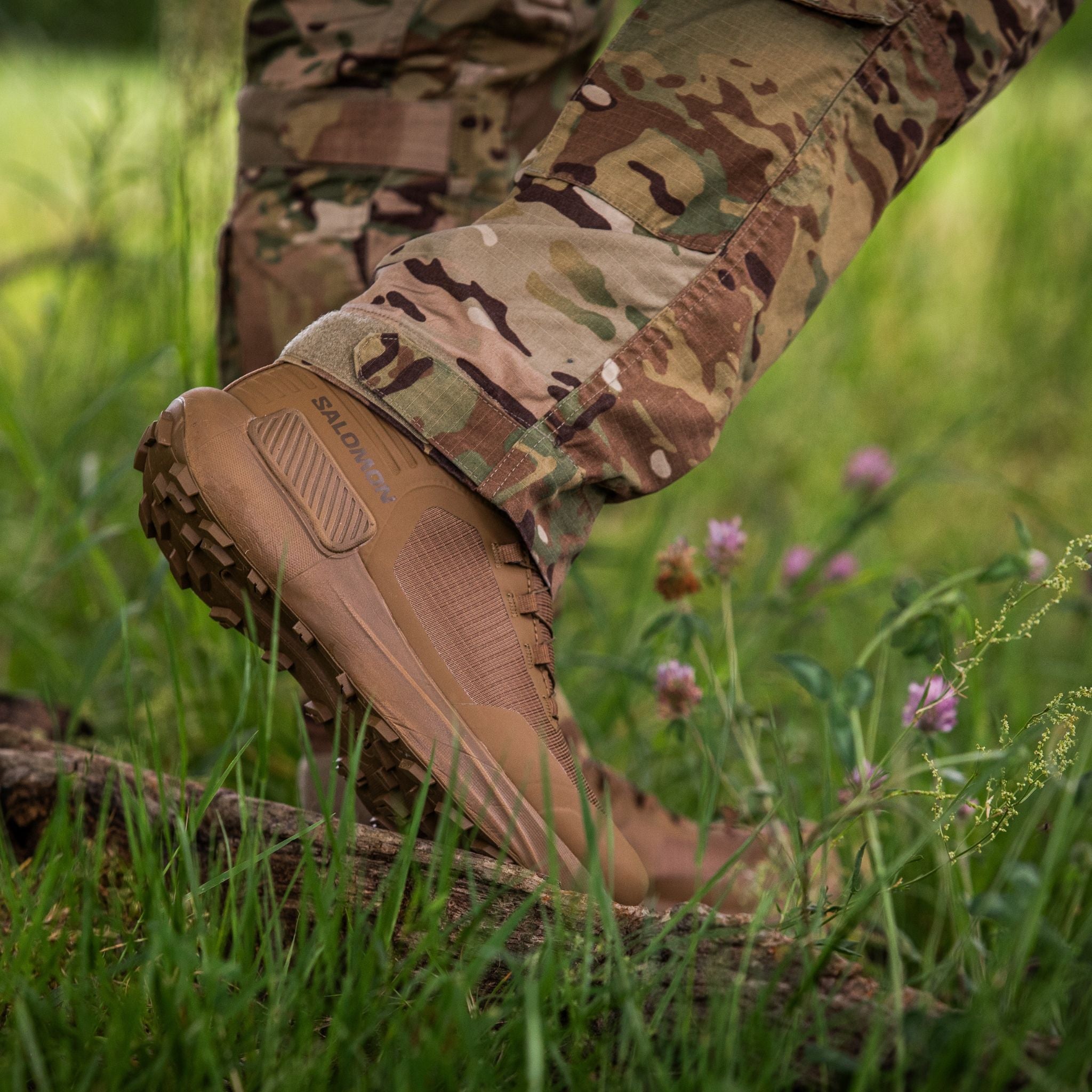 Model wearing multicam pants and the Salomon FORCES Genesis GTX in Coyote