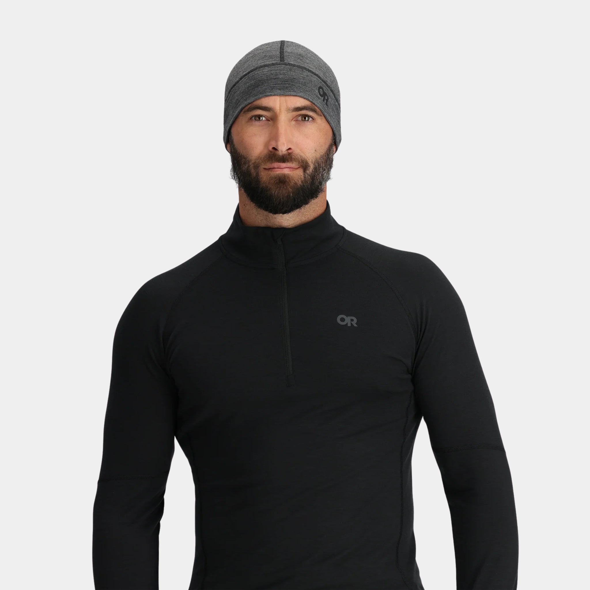 Outdoor Research Alpine Onset Merino 150 Beanie shown on a model in heather gray