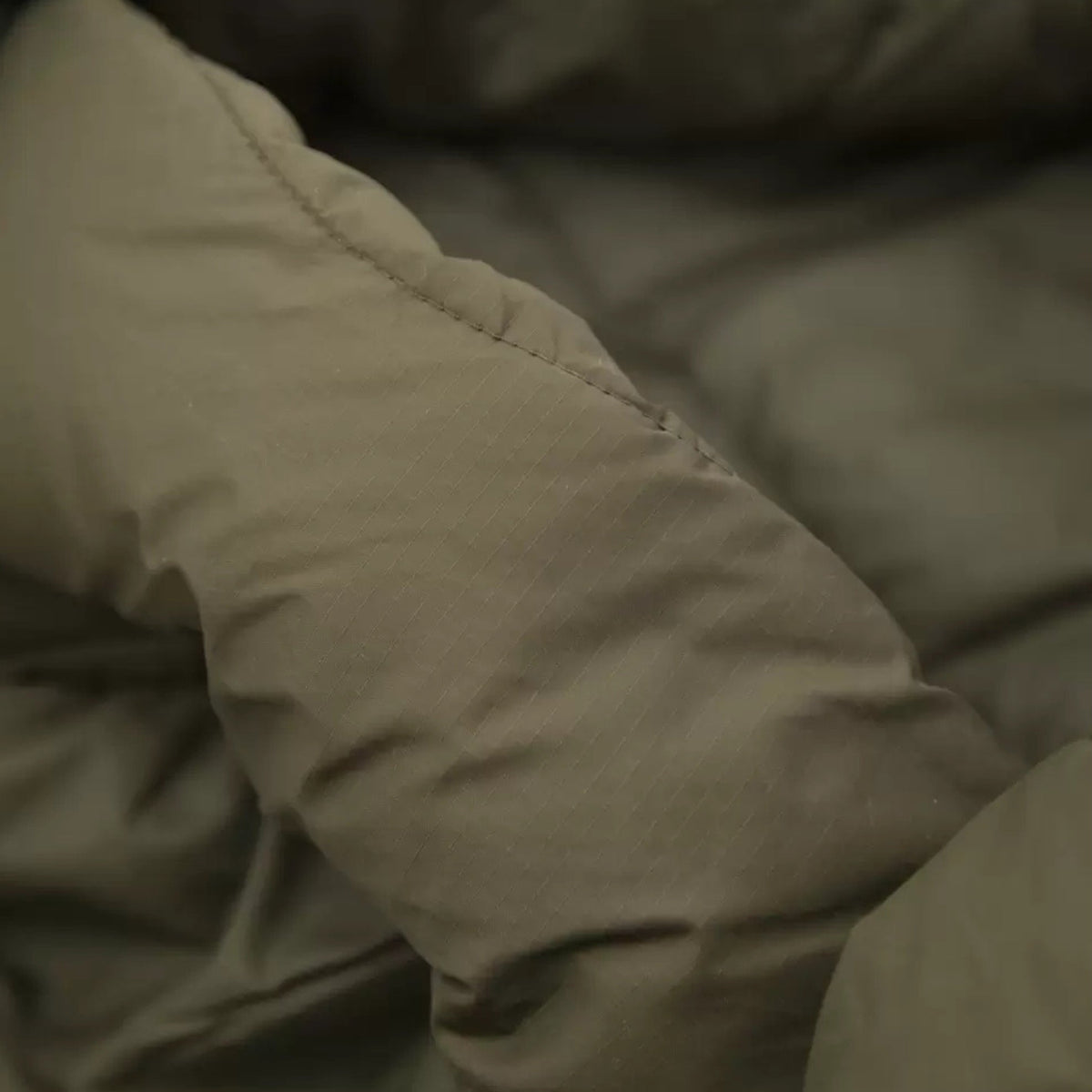 Carinthia Defence 6 Sleeping Bag with Shellproof outer shell and insulated zipper protection